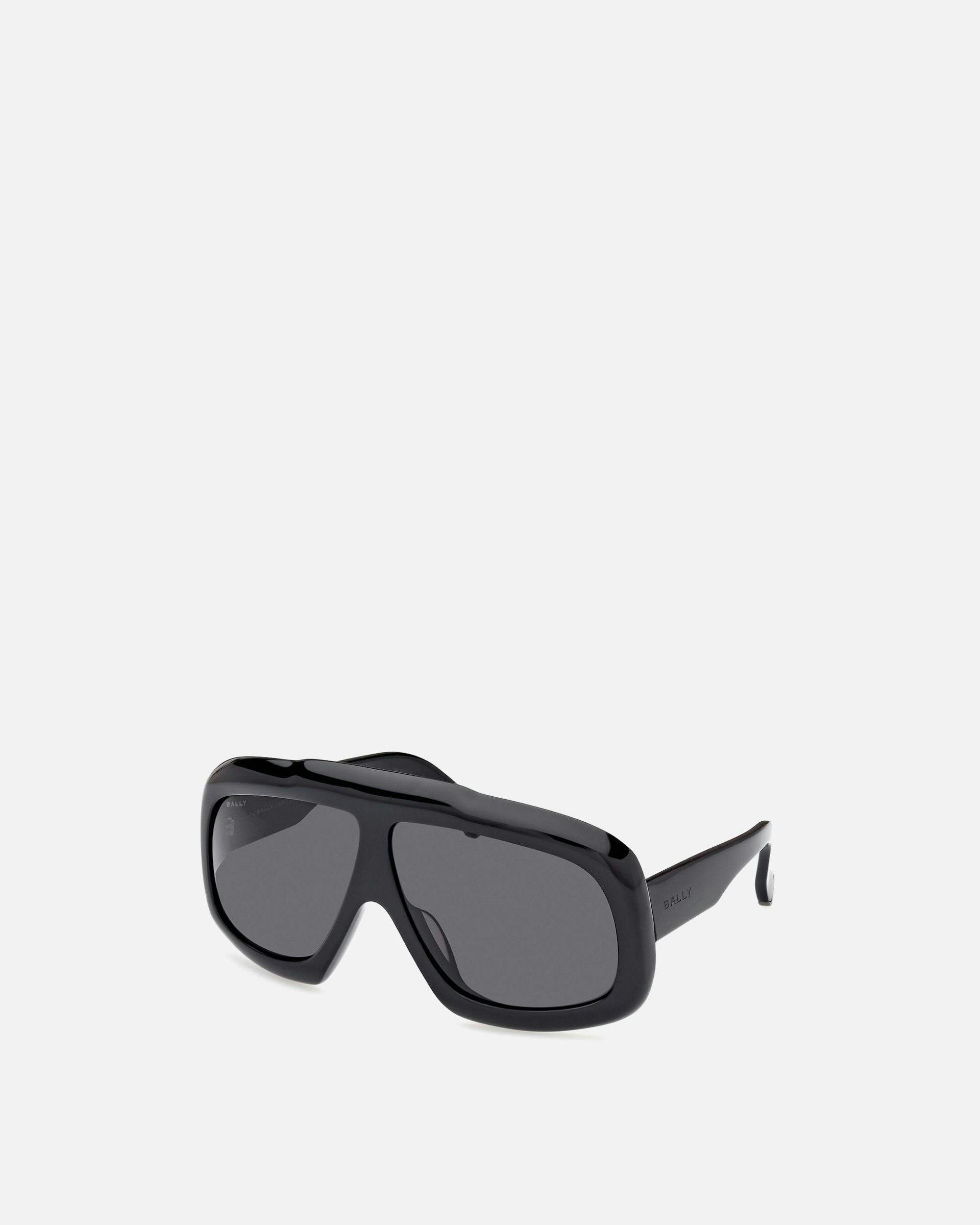 Eyger Acetate Sunglasses In Black and Smoke | Bally | Still Life 3/4 Side