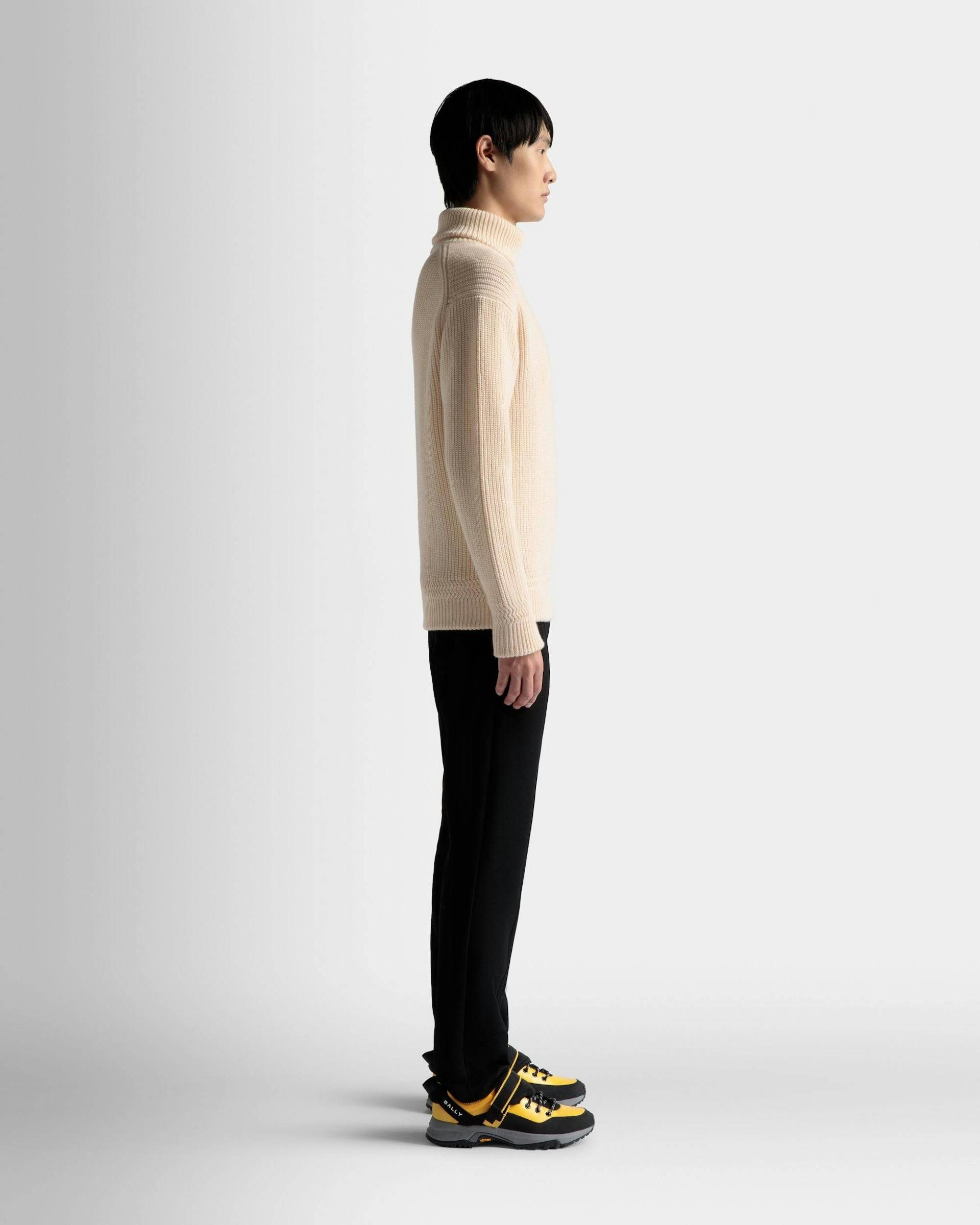 Men's Turtleneck Sweater In Beige Wool | Bally | On Model 3/4 Front