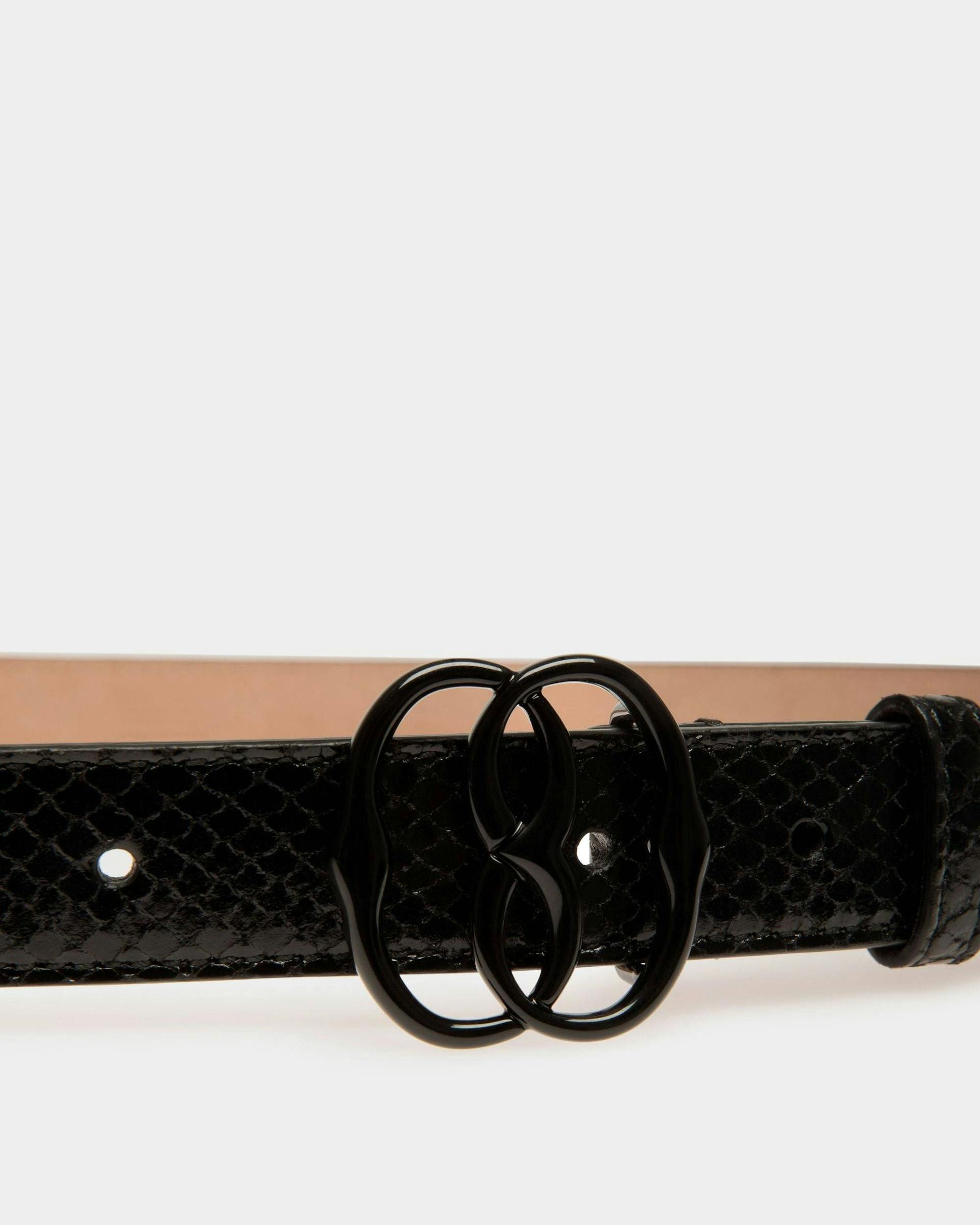 Women's Emblem 25mm Belt in Black Python Printed Leather | Bally | On Model Front
