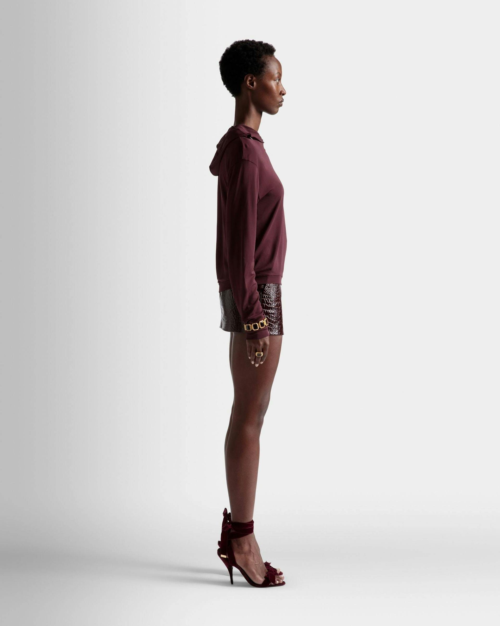 Women's Hooded Sweatshirt In Burgundy Fabric | Bally | On Model 3/4 Front
